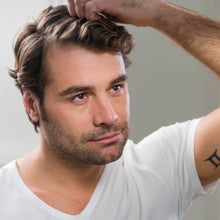 Load image into Gallery viewer, Man running fingers through his freshly washed hair