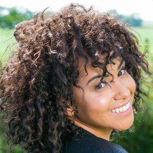 African American woman smiling in the sunshine