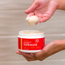 Load image into Gallery viewer, Woman using two fingertips to scoop a dollop of Premium Hair Growth Support Restorative Mask with Baicapil, Procapil, and Coconut oil